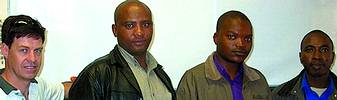 (l&#8211;R) Representing Graficomp, Russell Roy, representing the Lesotho government Dept. of Statistics, Makaliso Mapetja, Bereng Mokora and Tseliso Phafoli